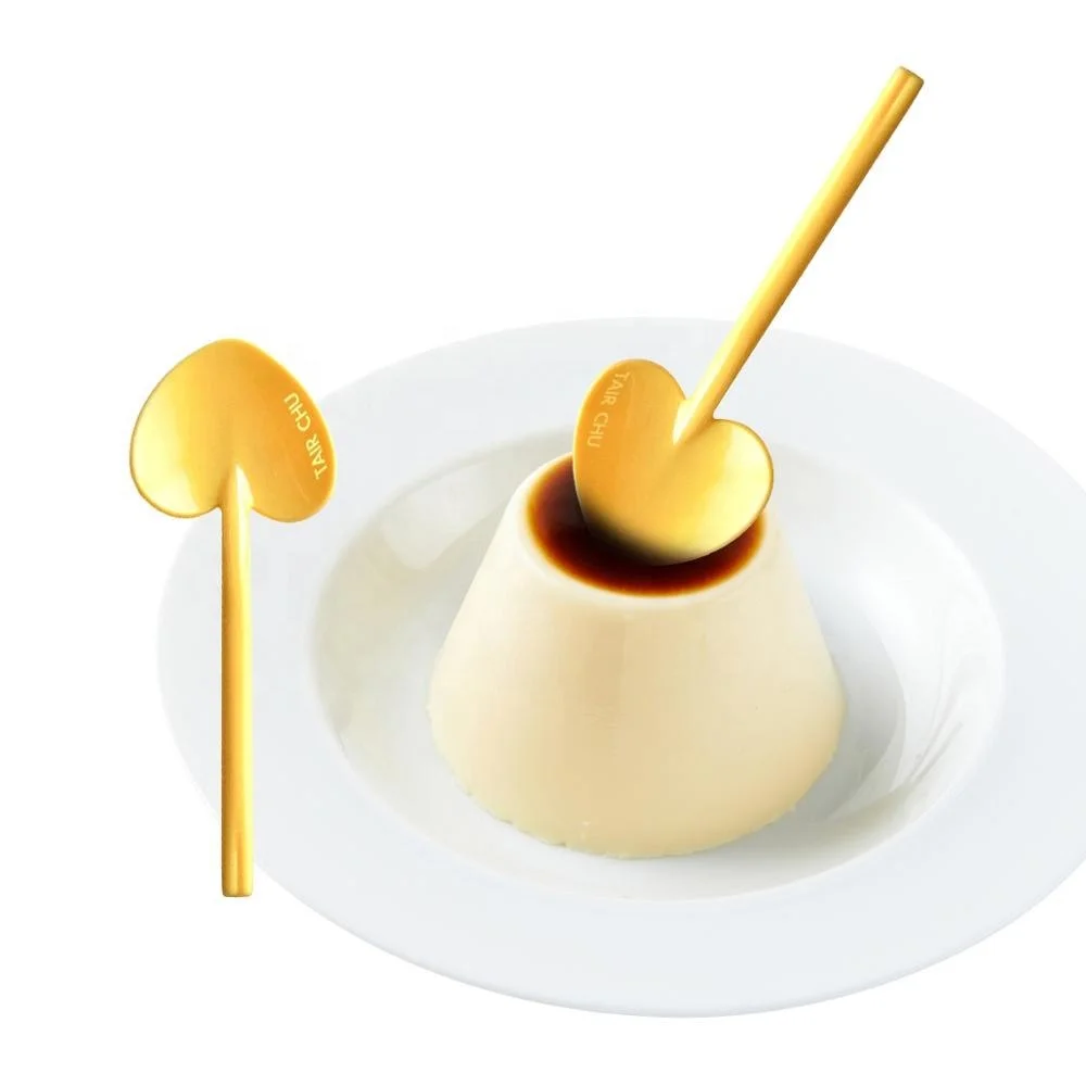 Yellow plastic pudding Spoon.jpg