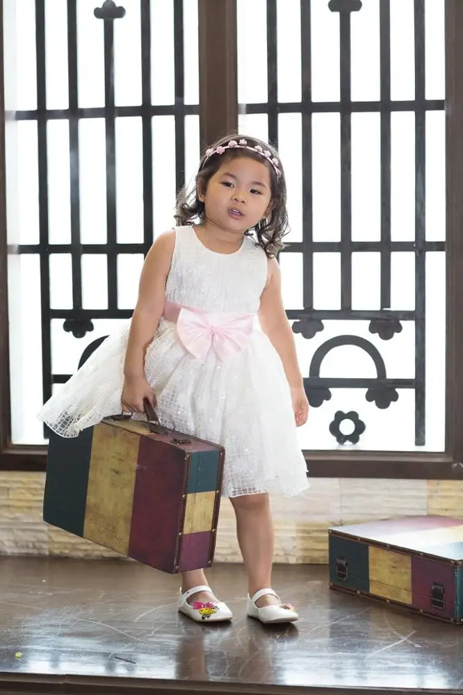 Beautiful white collection kid clothes dresses princess dress for girls, puffy layered dress for birthday party wearing.