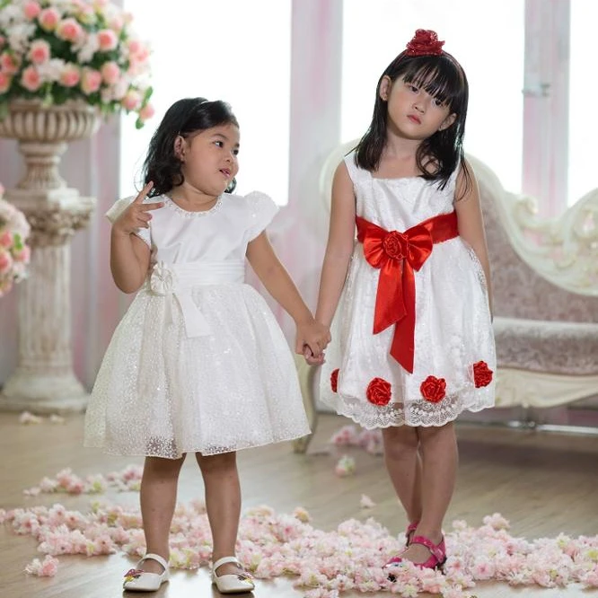 Beautiful white collection kid clothes dresses princess dress for girls, puffy layered dress for birthday party wearing.