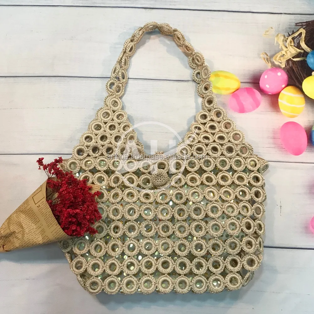 
Crochet rings bag bag with shiny sequin lining 