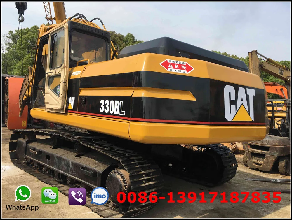 Used CAT 330BL excavator with jack hammer