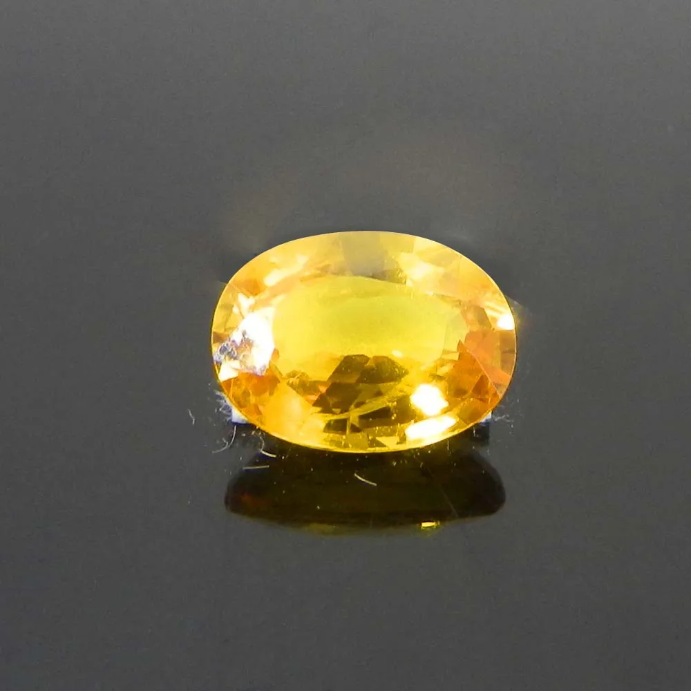 Natural yellow sapphire gemstone 10x7mm oval faceted cut 2.75 cts pukhraj birth stone