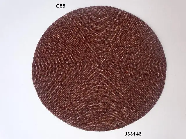
Wooden bead place mats in brown colour available in other colours also 