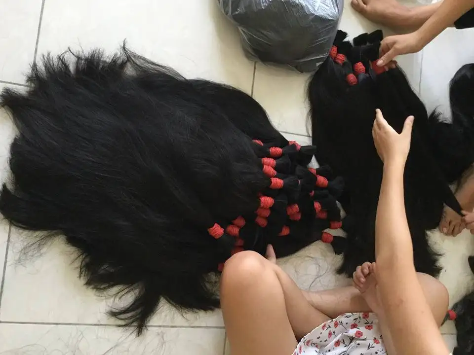 Wholesale Vietnamese factory price natural wavy raw hair, 100% virgin remy hair