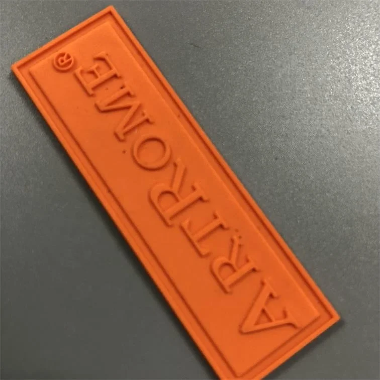 Custom pvc 3d clothing embossed rubber patch tag