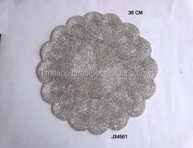 
Flower petal style round Glass bead place mat in silver colour other colours also available 