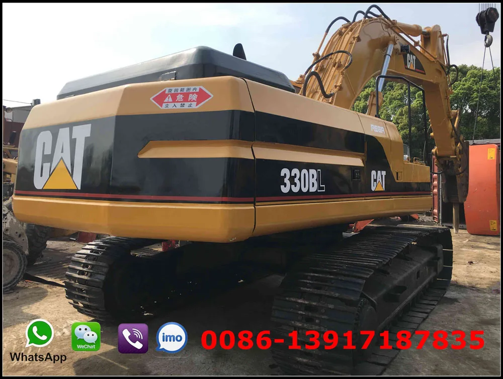 Used CAT 330BL excavator with jack hammer