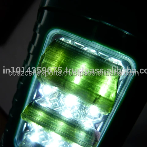 Драгоценный камень необработанный зеленый турмалин