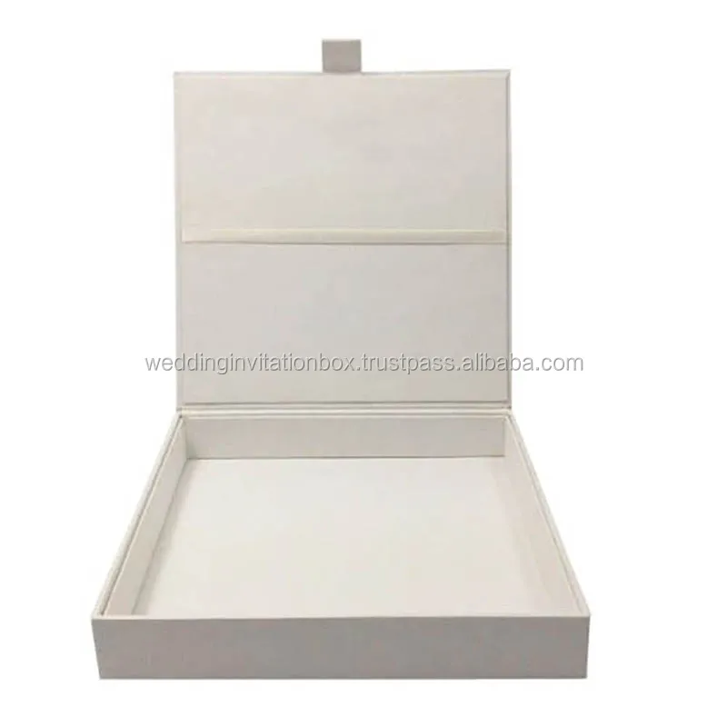 White hand-crafted paper wedding invitation box with thick cardboard walls