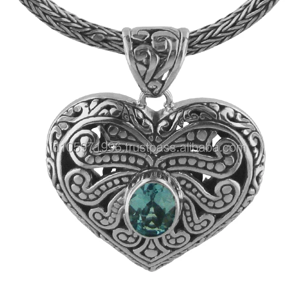 
Heart Shaped Handcrafted Sterling Silver Pendant with Blue Topaz 