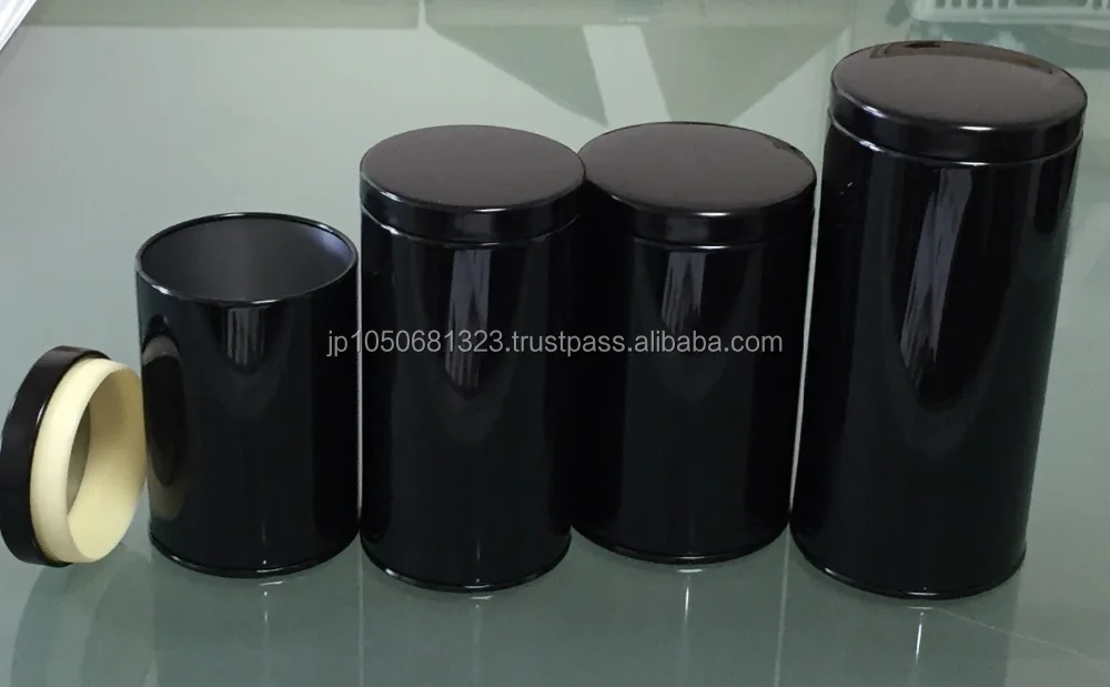 Round metal tin can with many different matte tea canister