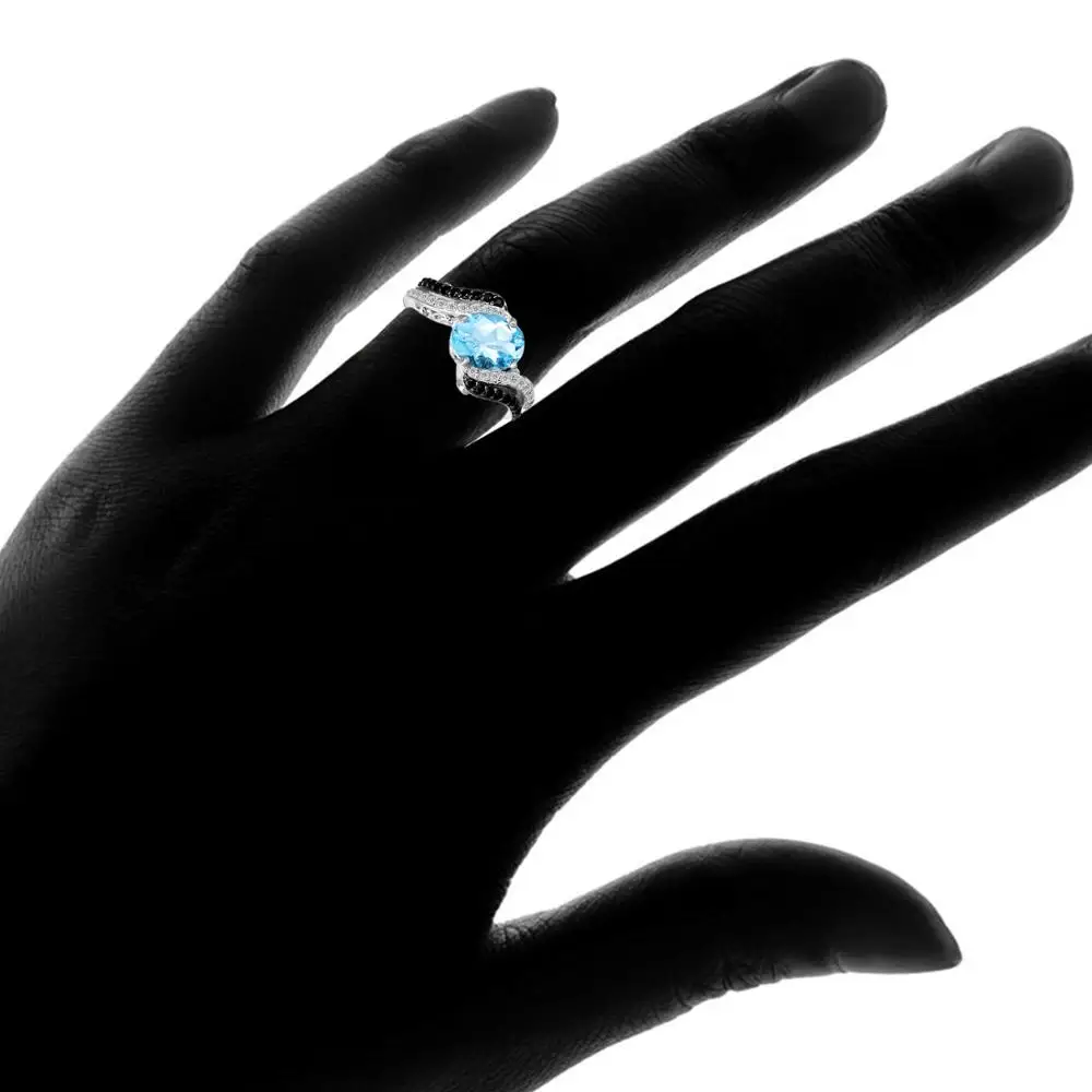 
925 Sterling Silver Oval Sky Blue Topaz and Black Spinel Bypass Ring 