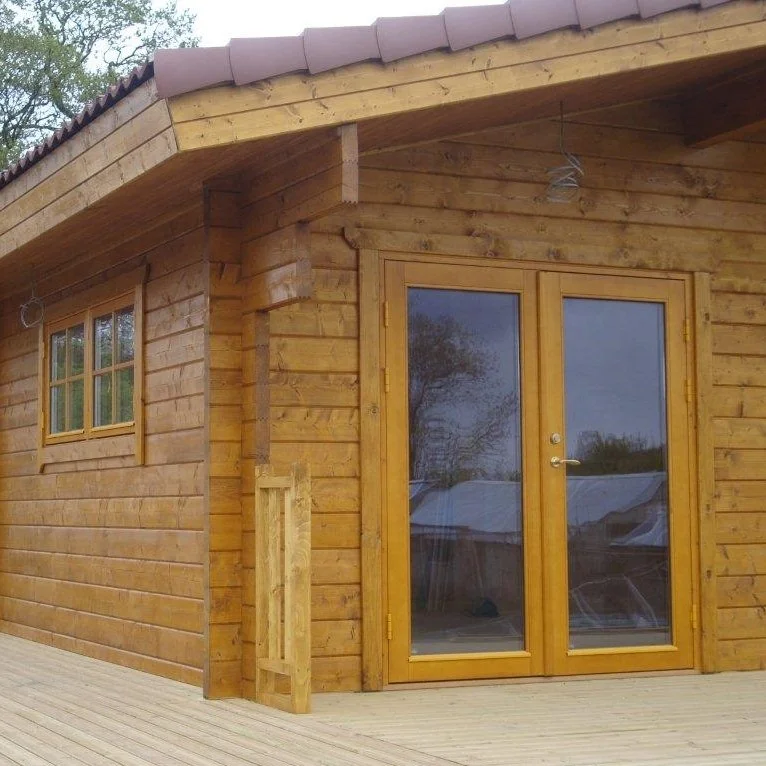 prefab cheap log cabin design kit UK caravan act specification mobile home energy saving green residential twin unit