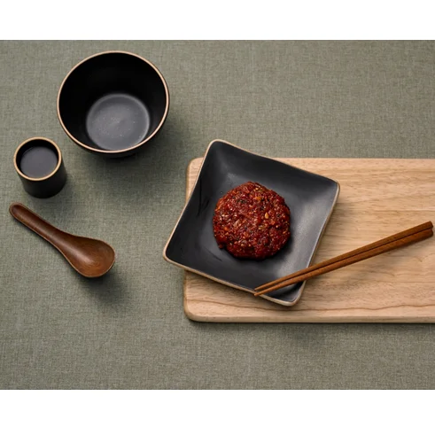 
Premium Korean Jeotgal - Spicy Seasoned Squid and Herring Eggs with Edible Seeds 