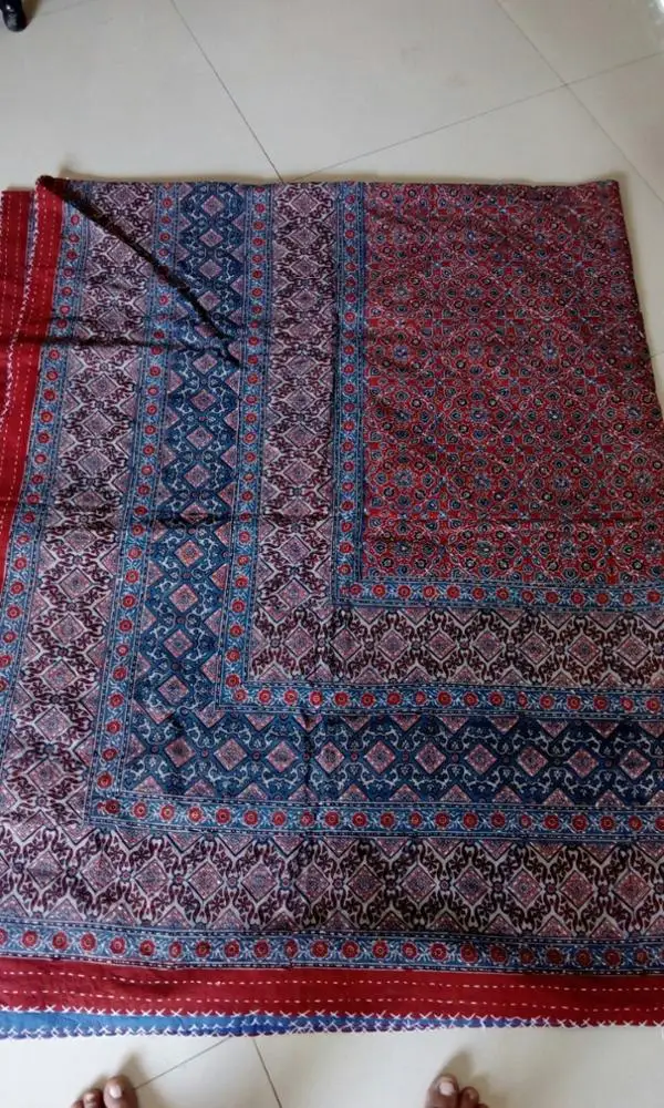 indian theme kantha quilts in colourful patterns suitable for home decor and for home textile stores