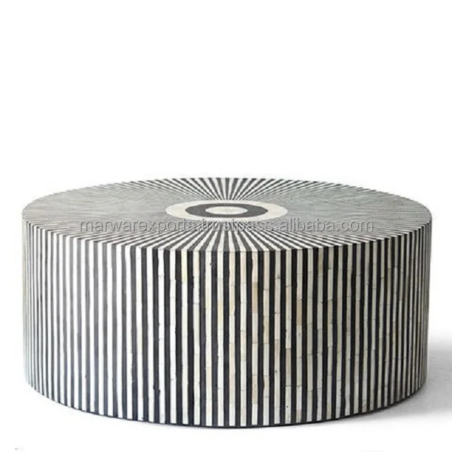 Круглый журнальный столик с инкрустацией в виде черной кости