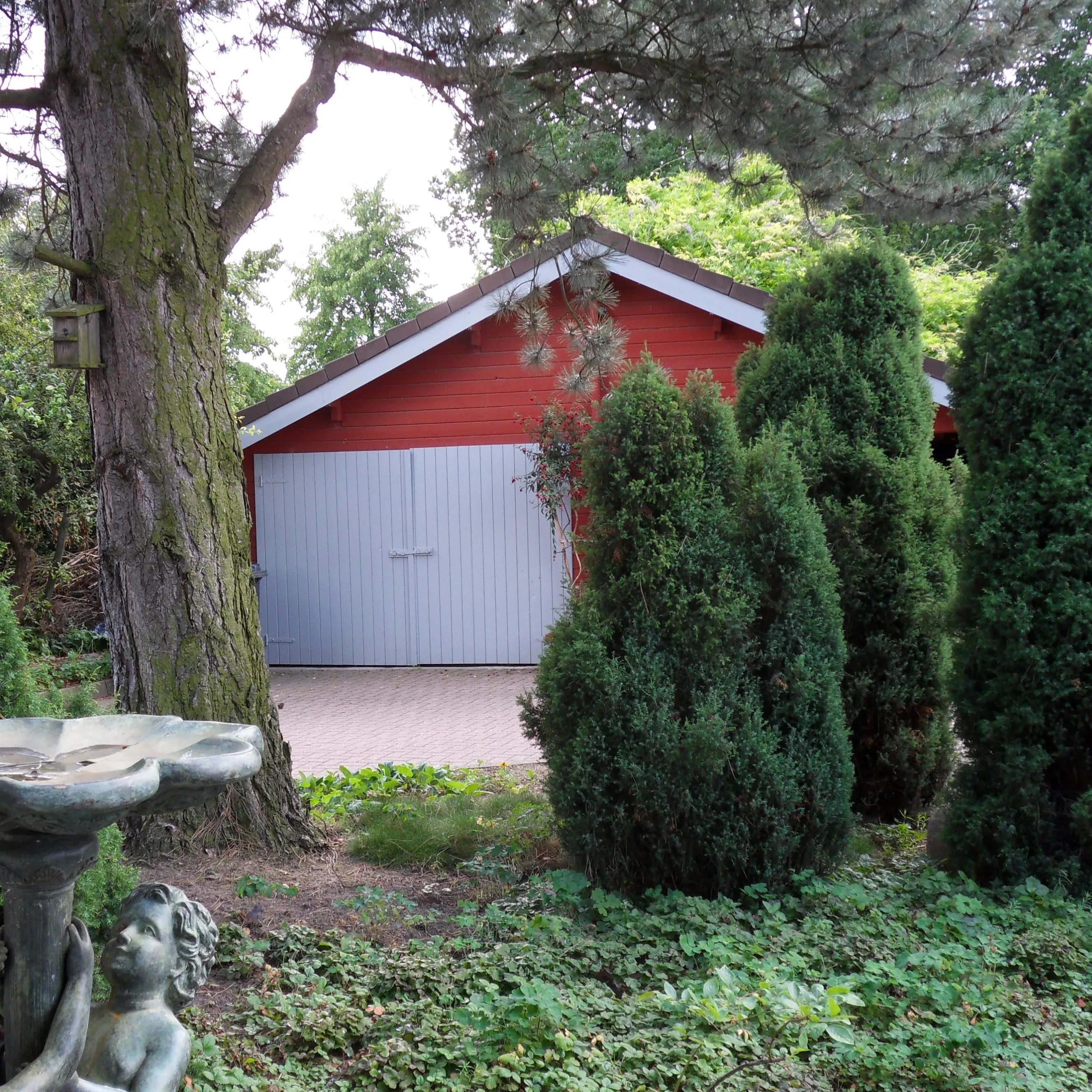 Бревенчатая кабина-двойной гараж