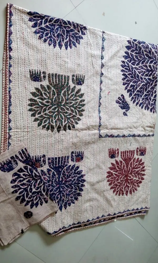 indian theme kantha quilts in colourful patterns suitable for home decor and for home textile stores