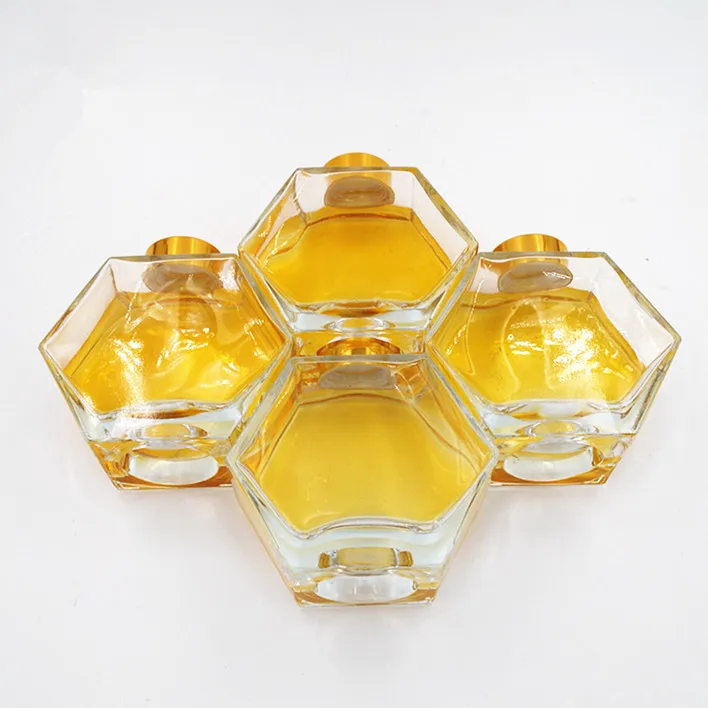 wholesale cheap 250ml honeycomb frosco vidrio hexagon polygon glass bottle honey bee glass jar with gold screw lid 8oz