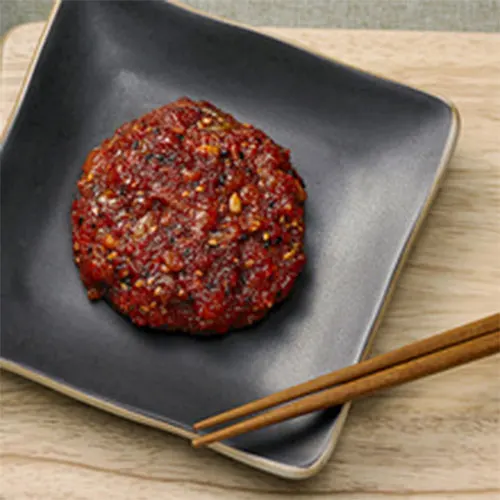 
Premium Korean Jeotgal - Spicy Seasoned Squid and Herring Eggs with Edible Seeds 