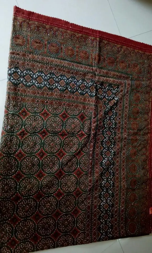 indian theme kantha quilts in colourful patterns suitable for home decor and for home textile stores