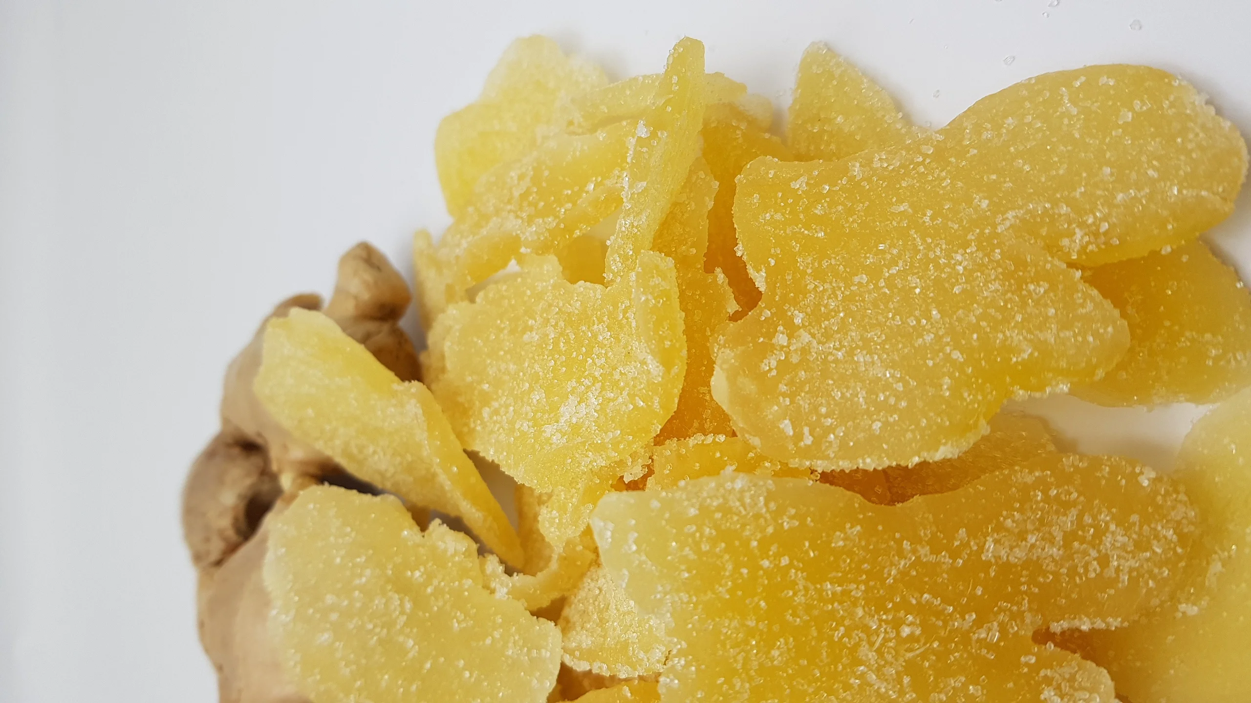 
Dried dehydrated ginger slices with cryslized sugar Thailand 