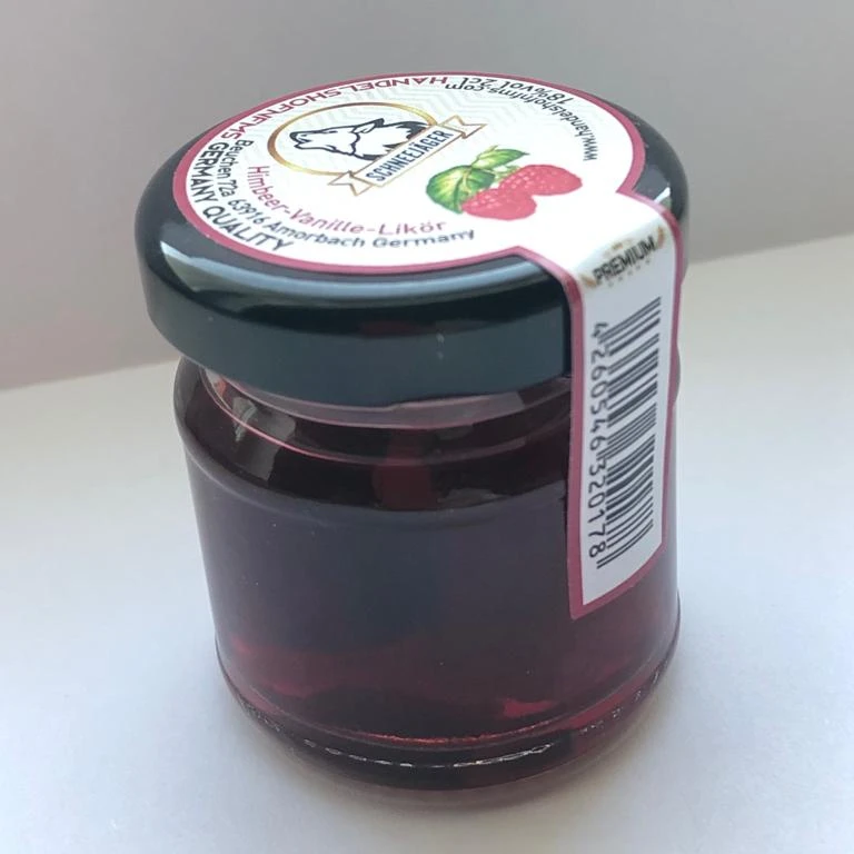 
 Коктейльный малиновый ликер с ягодами 18% Schneejager  