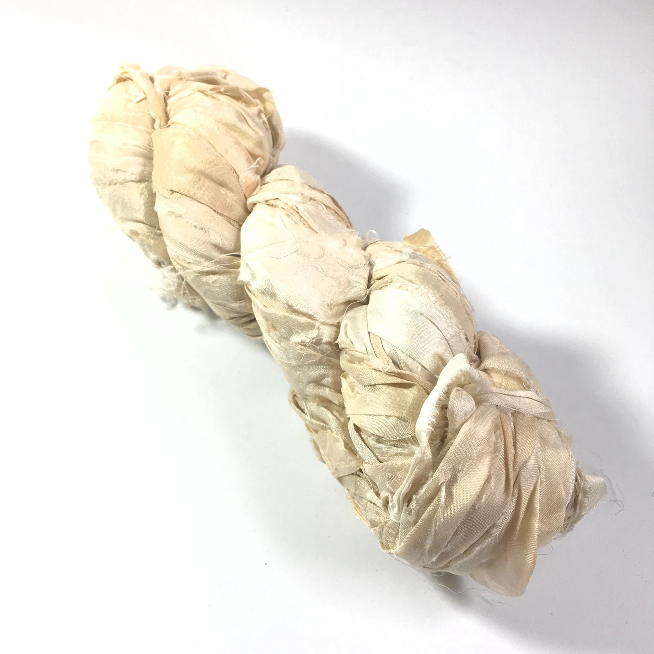 sari silk ribbon made from recycled silk sari available in 100 gram skeins suitable for yarn and fibre stores and for jewellery