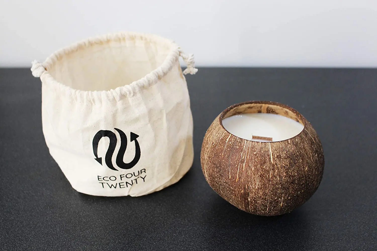 Natural eco friendly handmade candles in coconut shell bowls