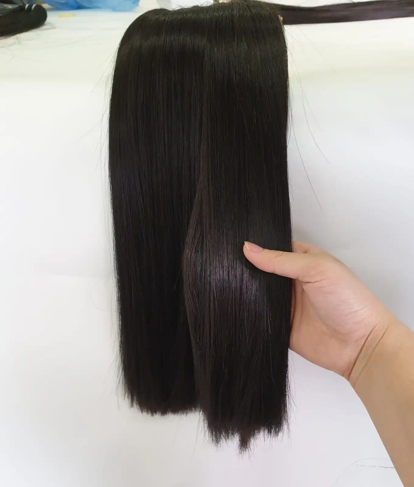 Высококачественная пучка волос для парика один донор естественный цвет оптовая цена