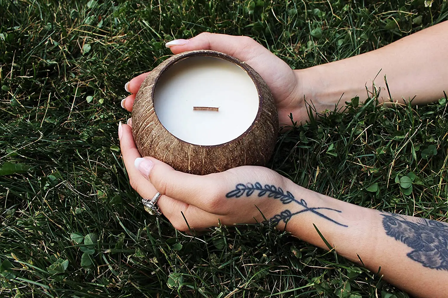 Natural eco friendly handmade candles in coconut shell bowls