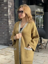 Женский длинный вязаный шерстяной кардиган с бахромой