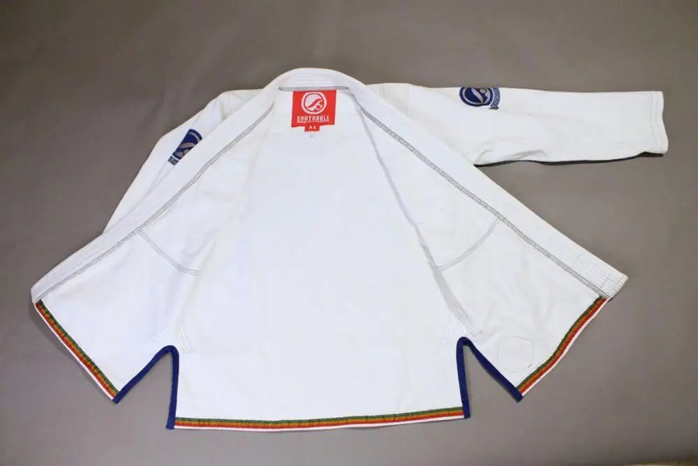 Low price Custom jiujitsu uniform white Double Weave BJJ Judo GI Kimono cotton Judo suit Judo uniform Brazilian Jiujitsu Gi