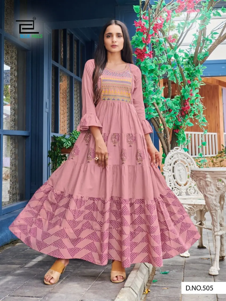 Desirable Elementry Cream colour  Long Gown with Frill Concept and heavy Embroidery work  in heavy Cotton Camric of Royal Export