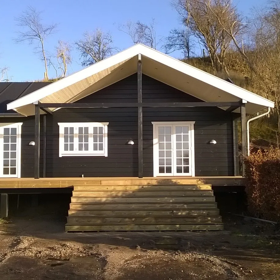 
prefab log cabin wooden house low carbon foot print EU norms 