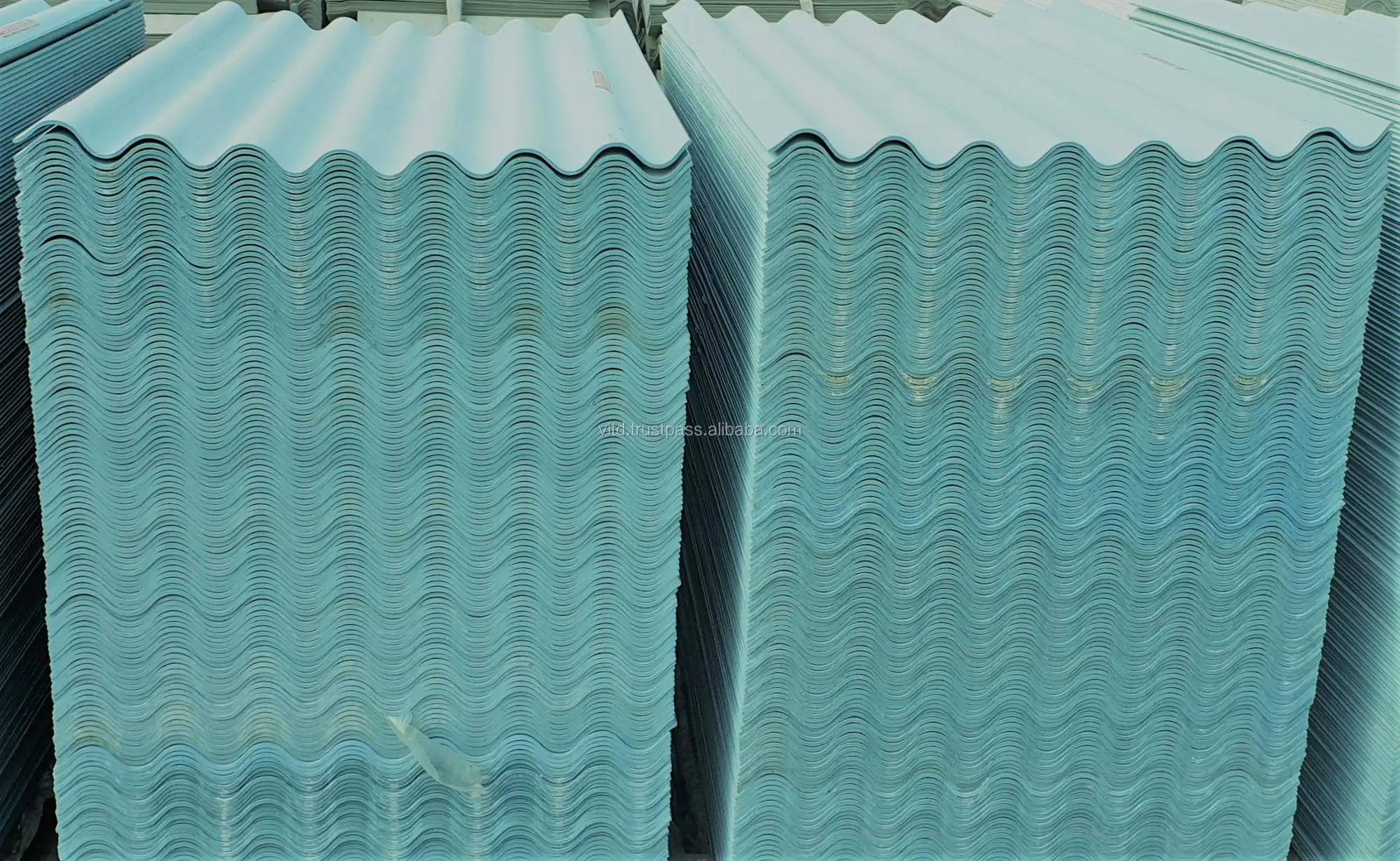 Fiber reinforced roofing sheets