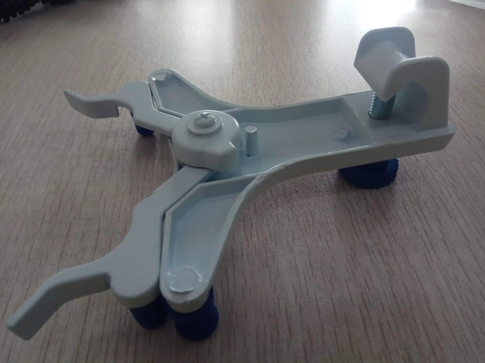White Plastic Burette Clamp for holding two burettes with spring loaded self closing jaws