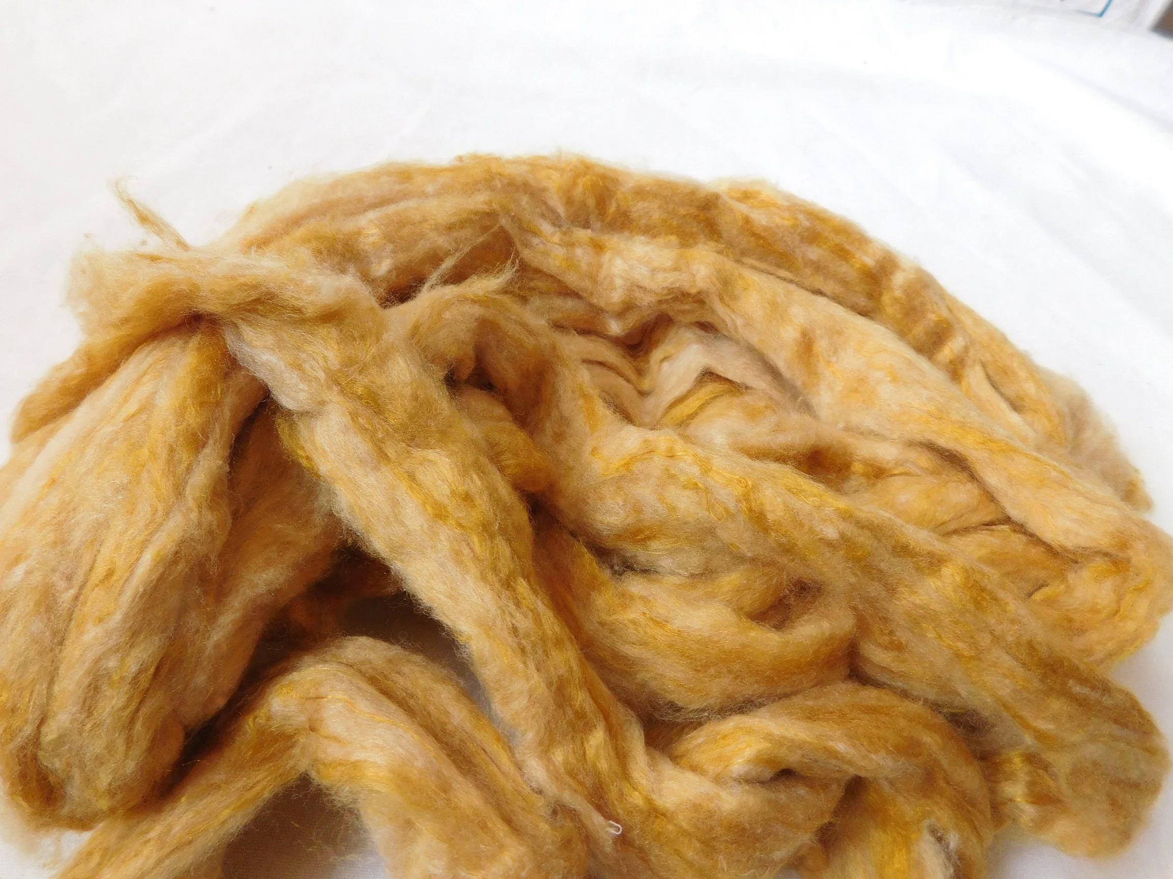 sari silk roving in two tone custom dyed colors suitable for yarn and fiber stores made from recycled silk fiber