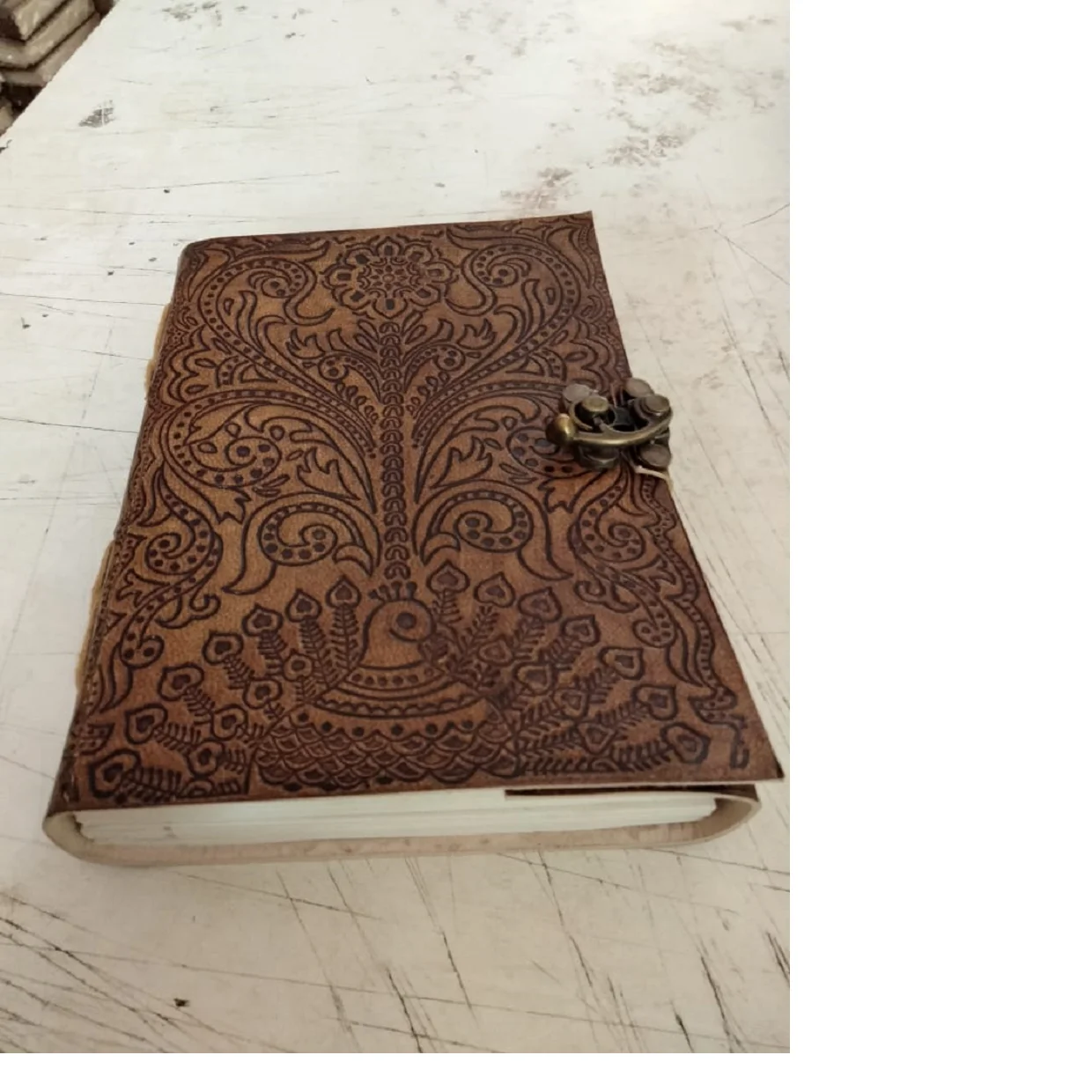 custom made brass embossed antique deckle edged paper journals