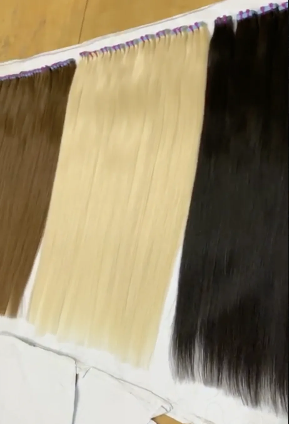 Wholesale Invisible Double Drawn Remy Tape In Human European Hair Extension genius weft Available at Affordable Price