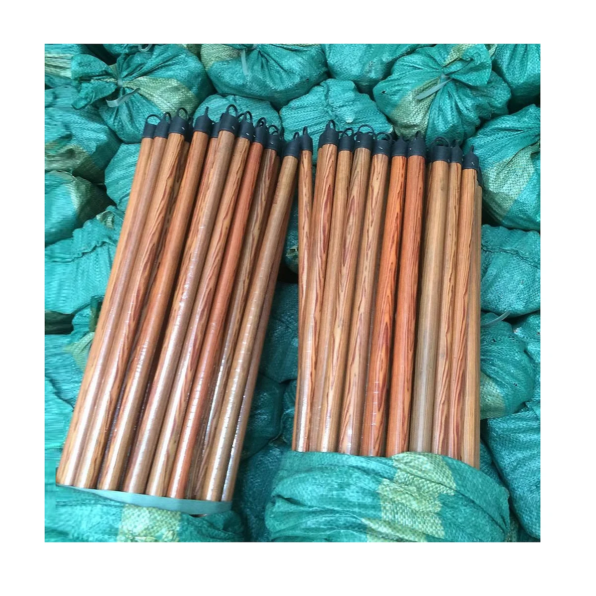 Best selling wooden broom handle eucalyptus wood rods broomstick wholesale exwork cheapest price in Vietnam supply bulk