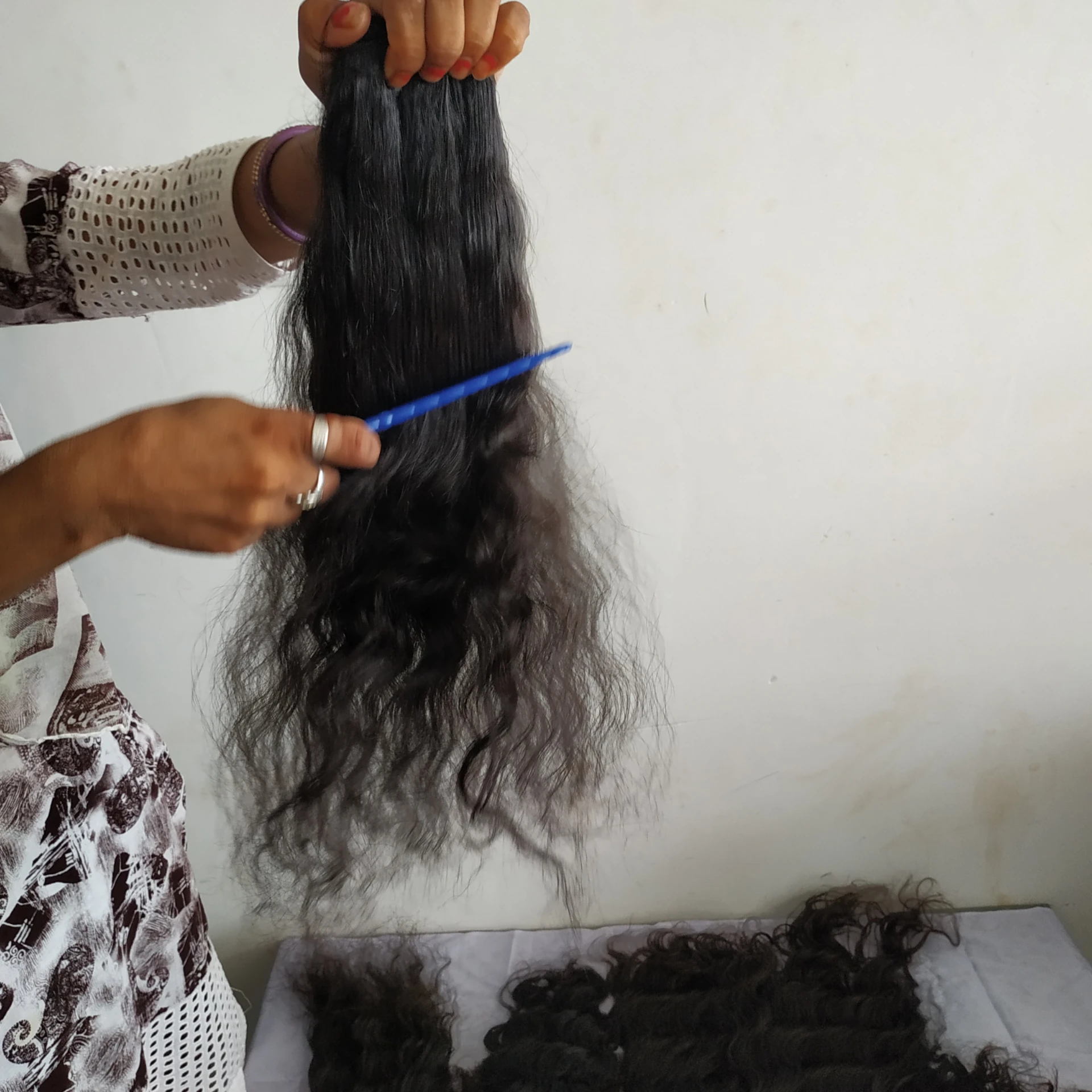 Natural unprocessed Raw virgin wavy Indian human hair