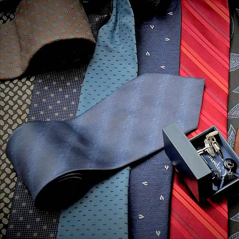 Rotating slatwall hook display silk ties for shop