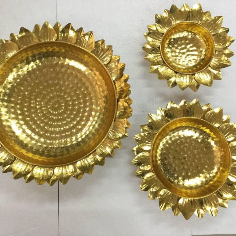 Iron platter in gold colour with design of line on lotus leaves and multiple shades of colour Diwali item new designee