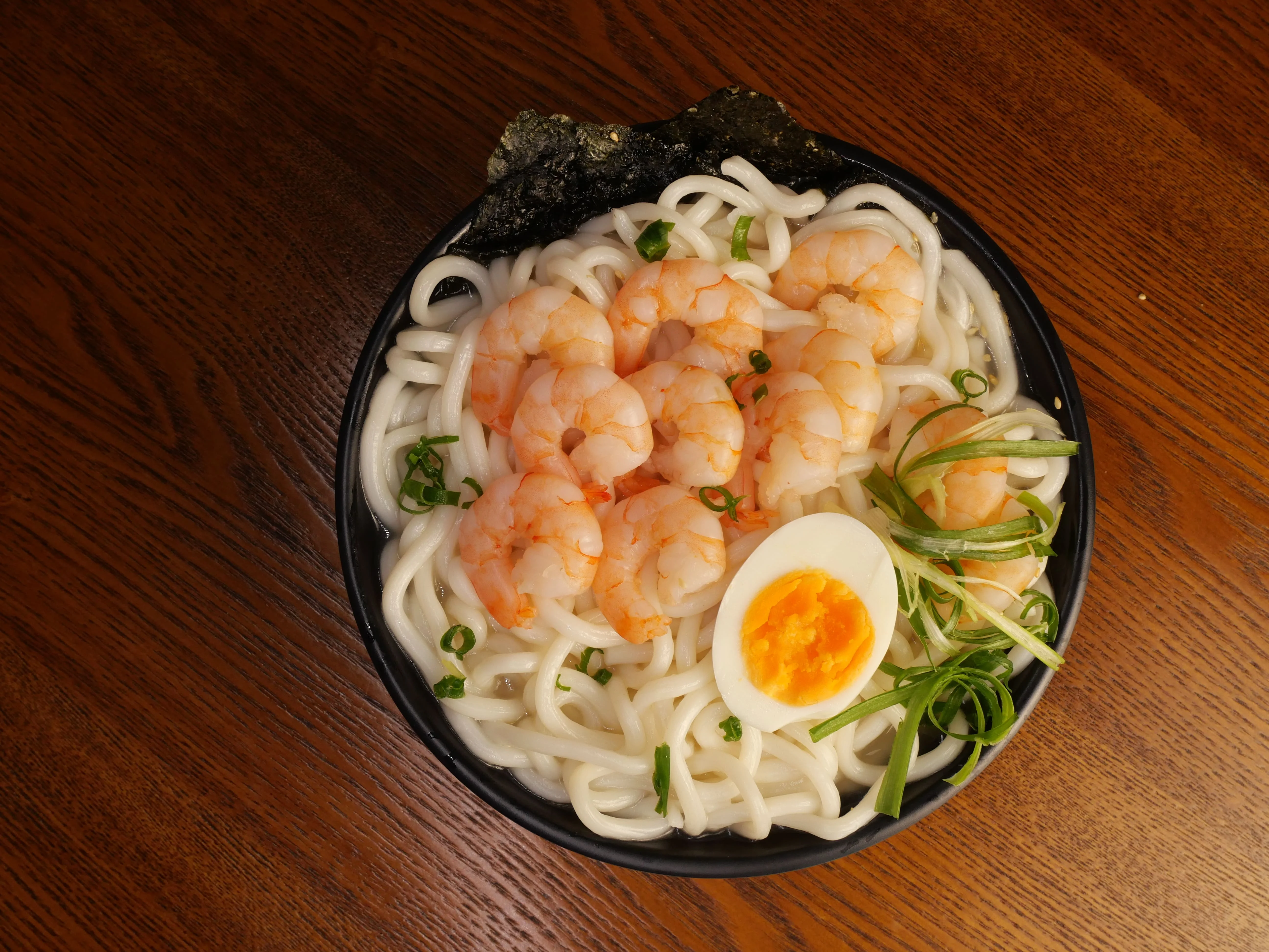 Hidee Udon with a variety of fresh vegetables and seafood parwn eel noodles