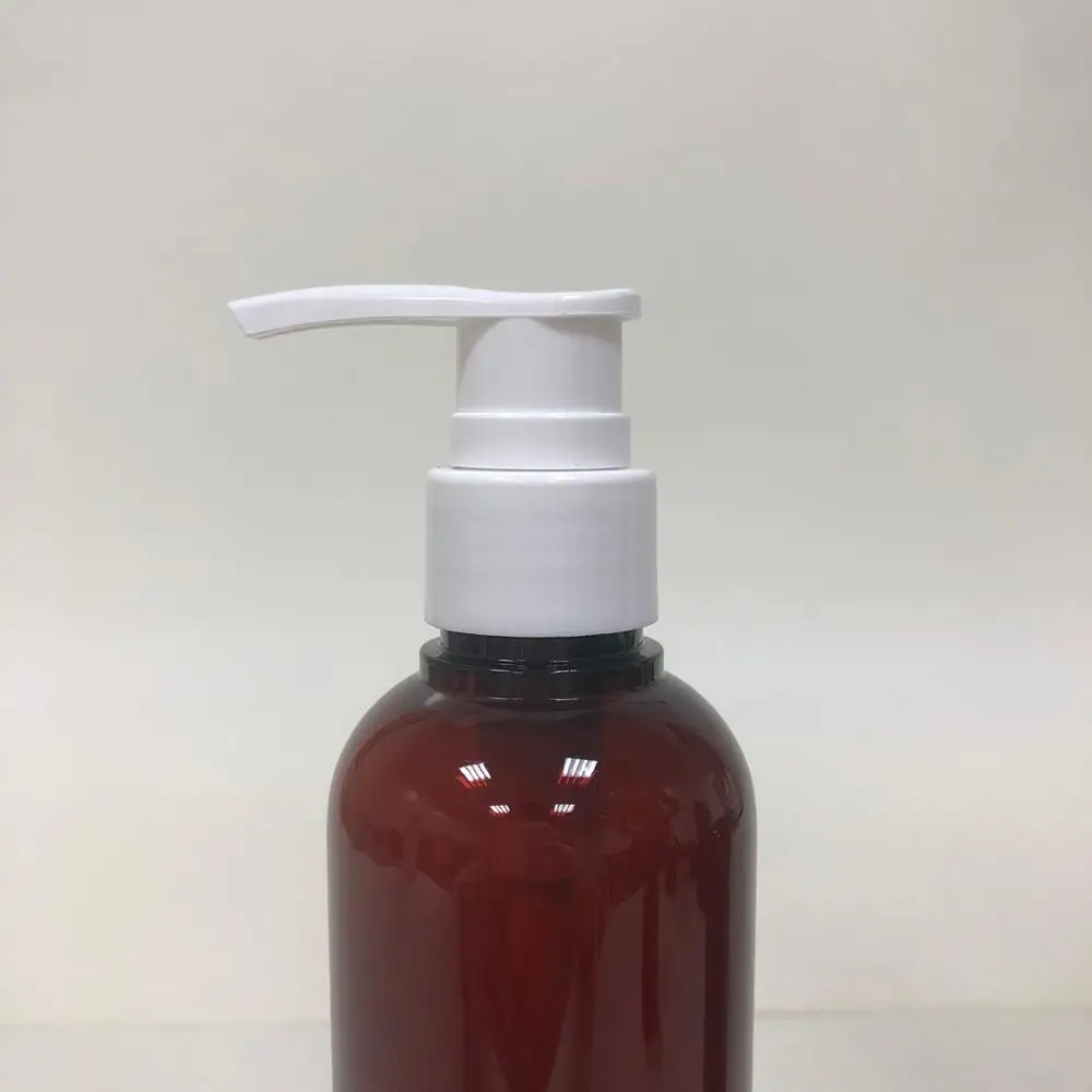 amber plastic PETG round bottle with white pump