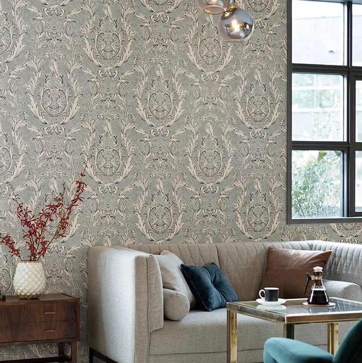 A chic wallpaper designed with a parrot nestled in a damask pattern.