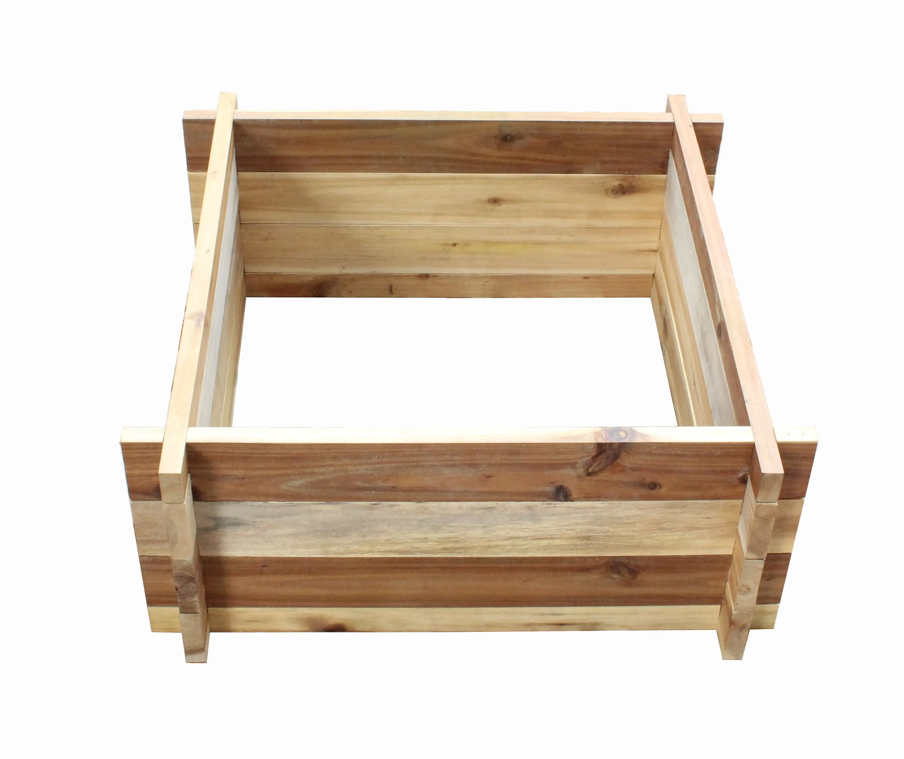 Square wooden planter box in the garden