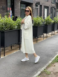 Женский длинный вязаный шерстяной кардиган с бахромой