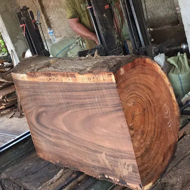 Unfinished wood from African Raintree timber, decking boards and wooden panels